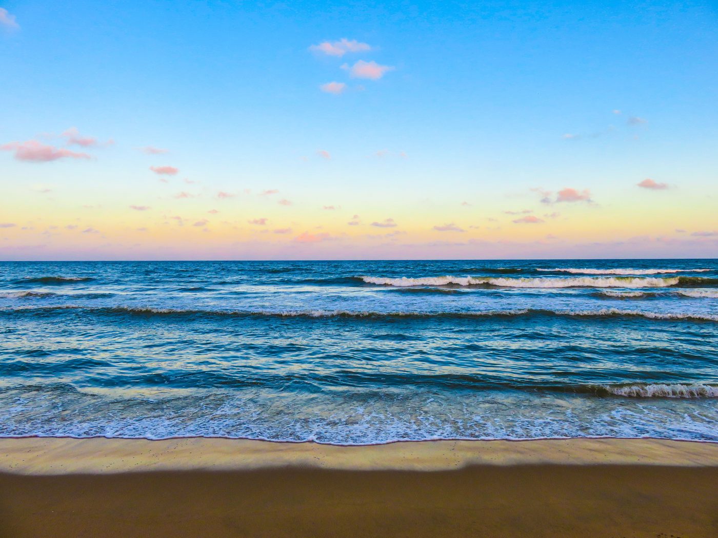 Sunset over the sea and shore at AmanDagat