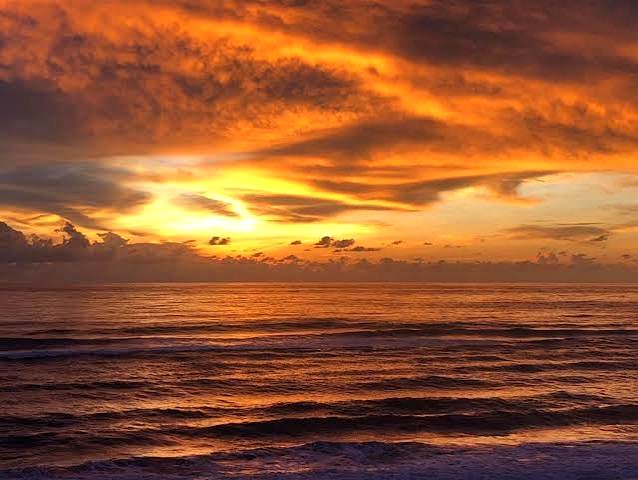 Golden waves at sunset