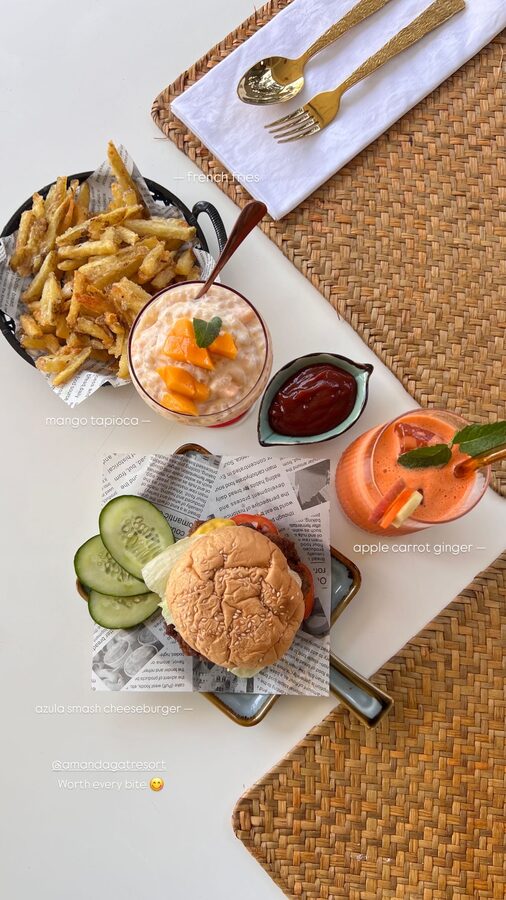 A guest&rsquo;s photo of the A&rsquo;Z&uuml;la smash cheeseburger, fries and mango tapioca