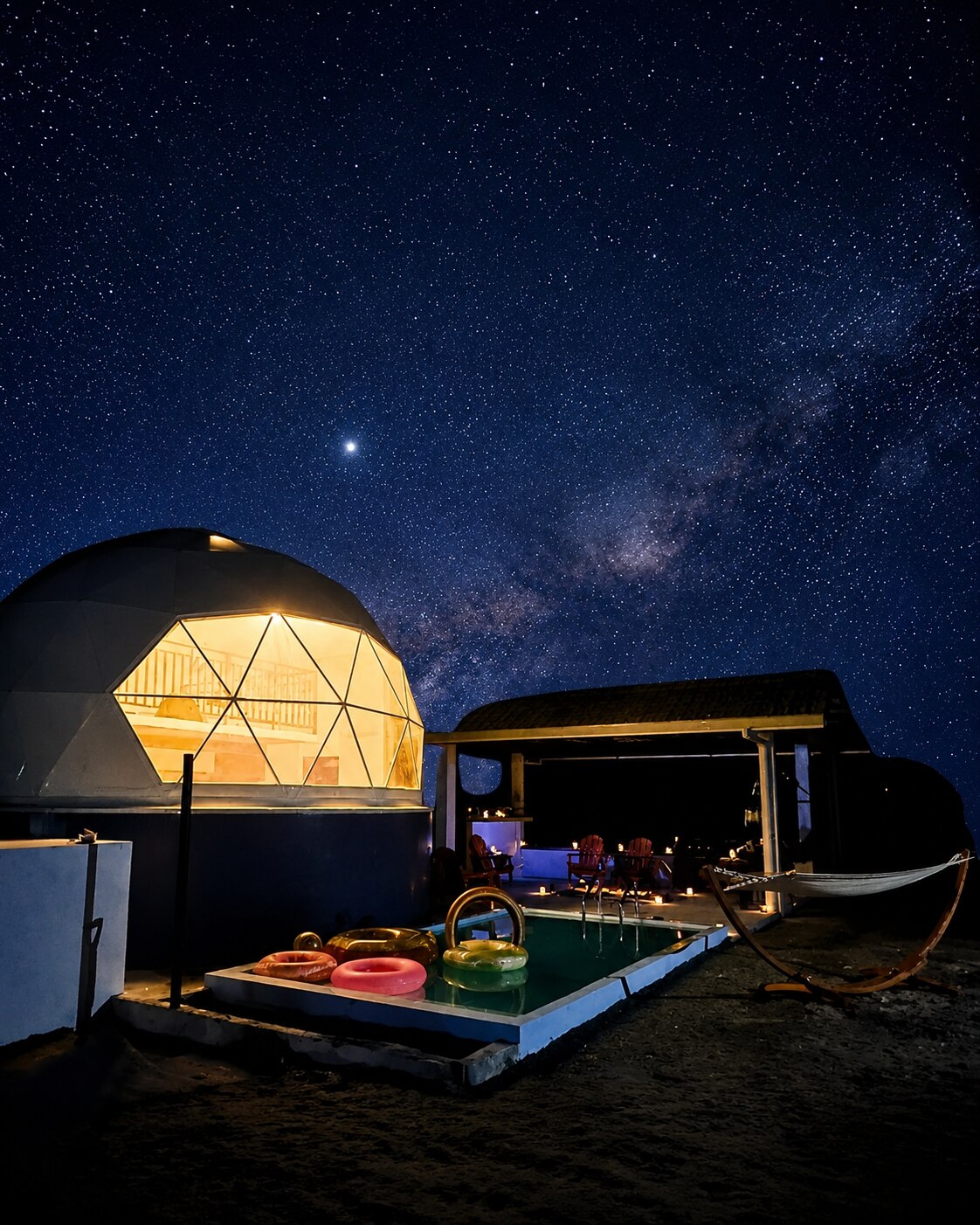 A Dome Pearl Villa glowing beneath the Milky Way