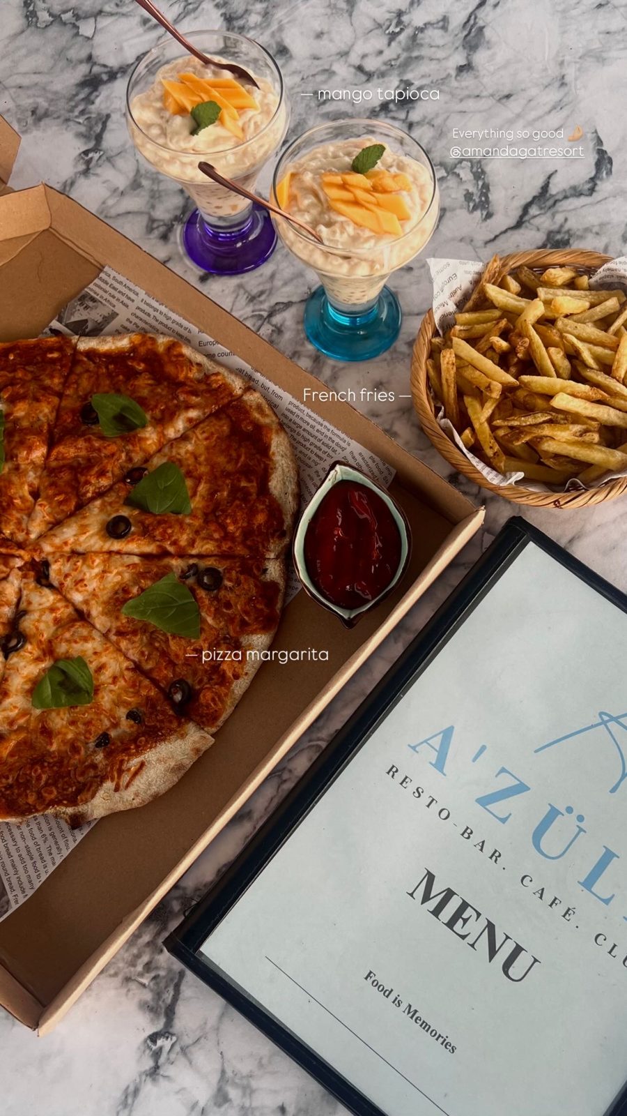 A guest&rsquo;s order &mdash; pizza, fries and mango tapioca with the A&rsquo;Z&uuml;la menu
