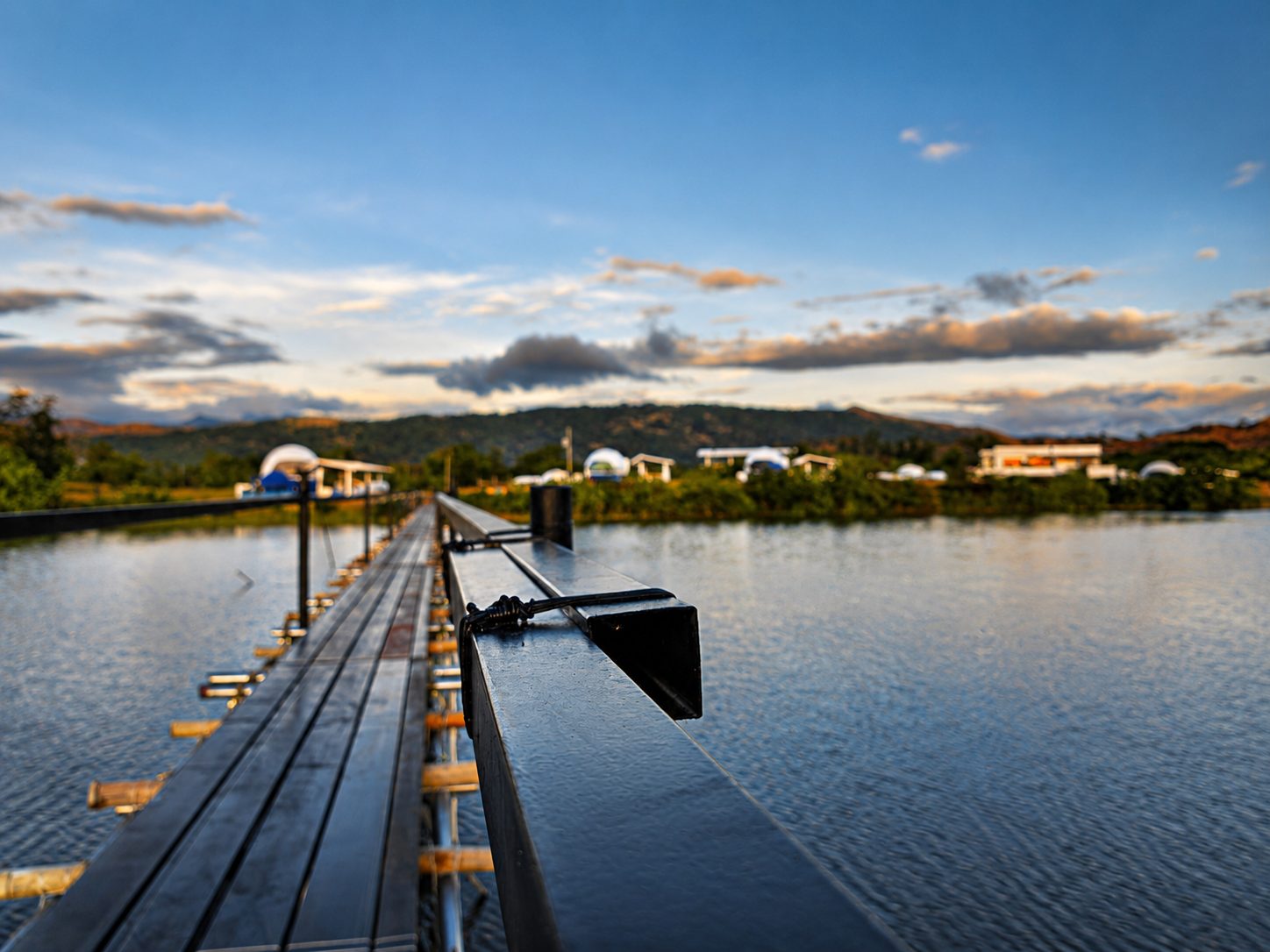 The Pearl Bridge crossing the river to the beach, domes along the shore
