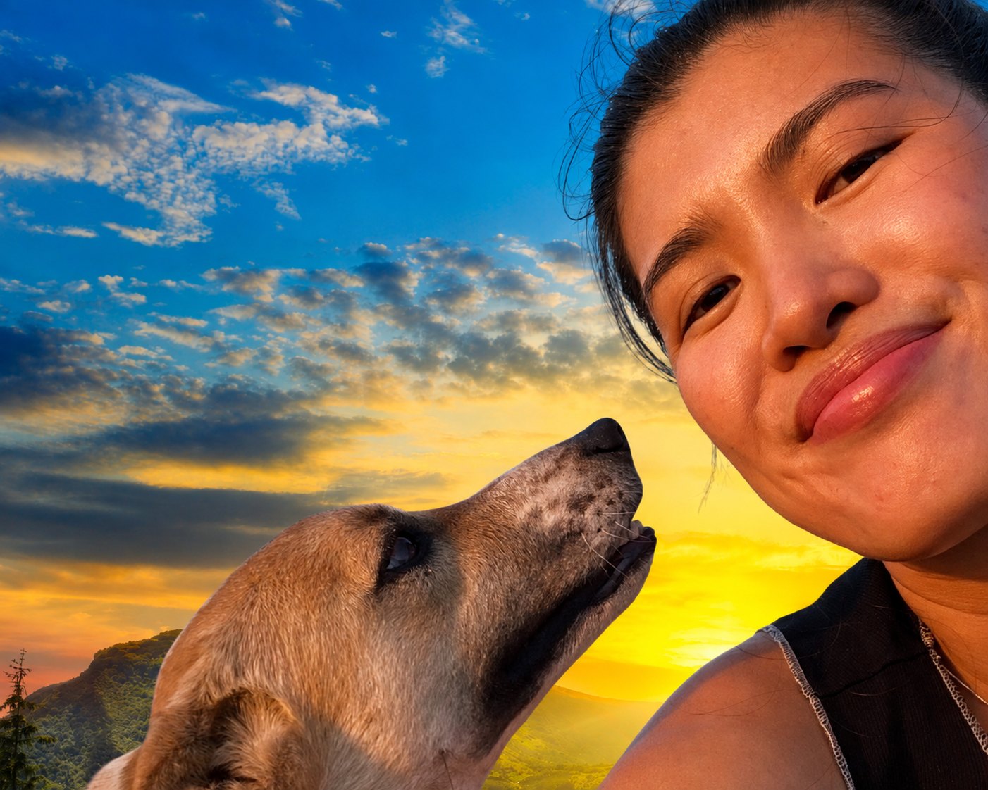 A guest and her dog sharing a sunset selfie