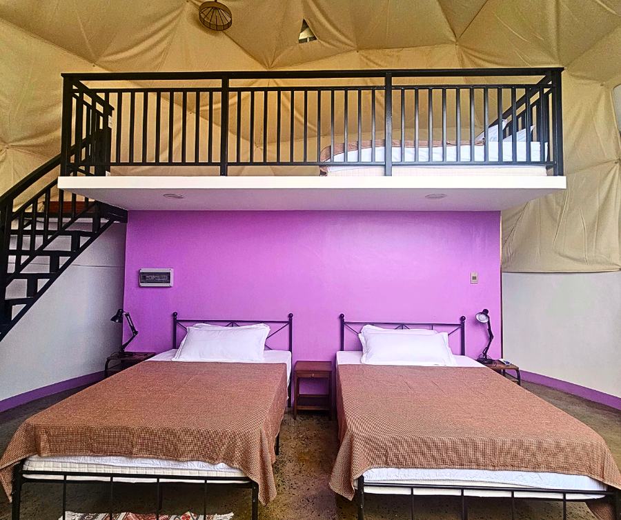 8-Guest Dome Pearl Villa interior with two queen beds and mezzanine